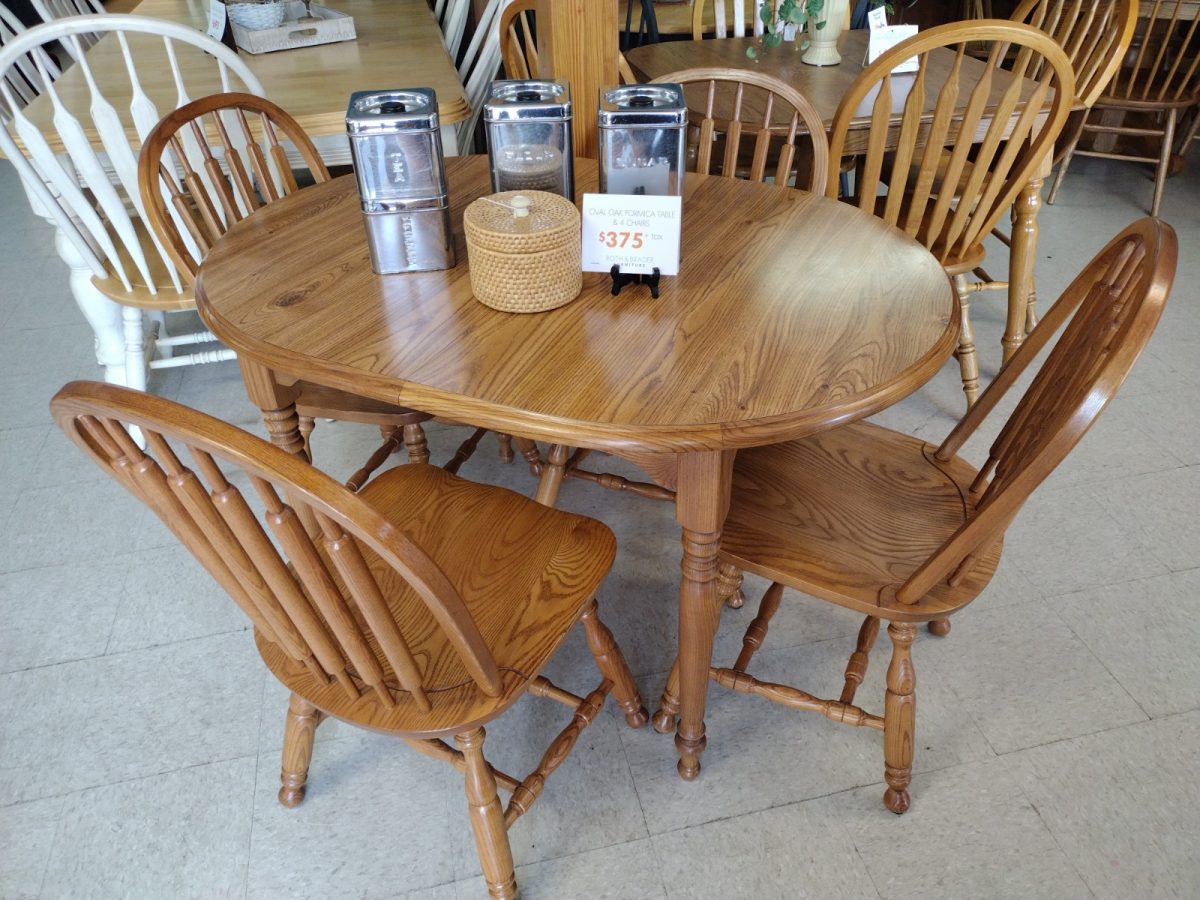 Oval Oak Formica Table with 4 Chairs & 1 Board Roth & Brader Furniture