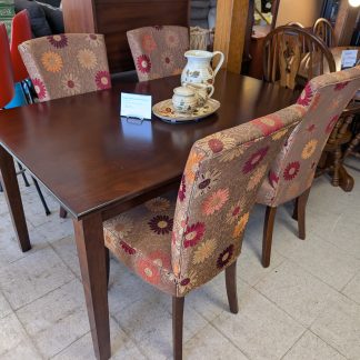 Brown Table with Floral Chairs